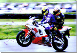 Niall Mackenzie taking me for a spin in  Oct '98 around a wet Knockhill, Our bum's are so small we both fitted on the same seat !